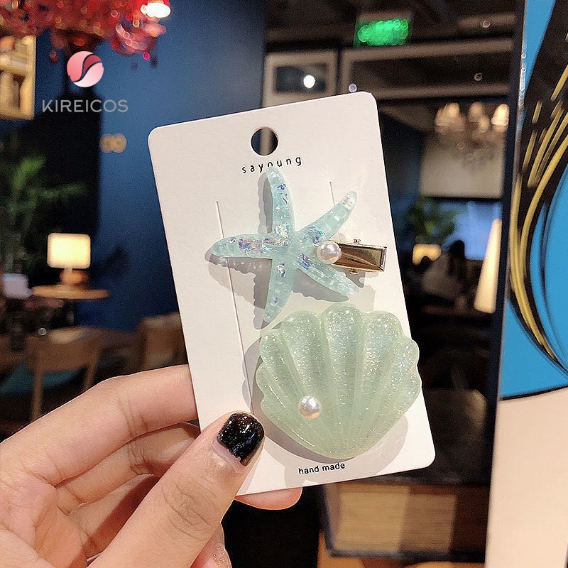 Set 2 Kẹp Tóc Sao Biển Và Sò Cao Cấp