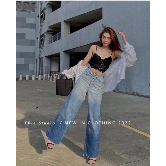 Quần jeans loang rách