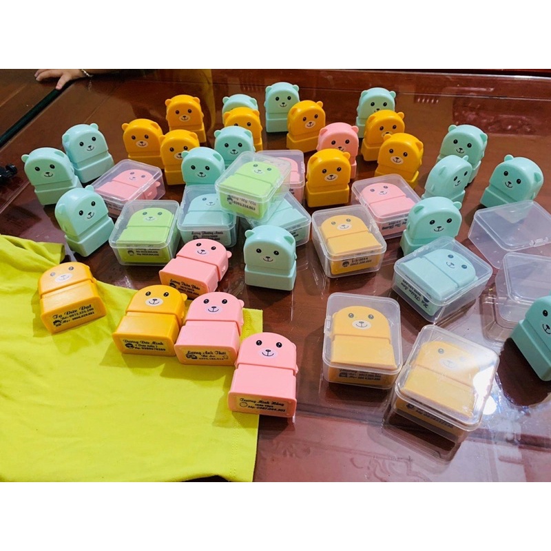 Con dấu khắc tên cho bé trên quần áo không phai