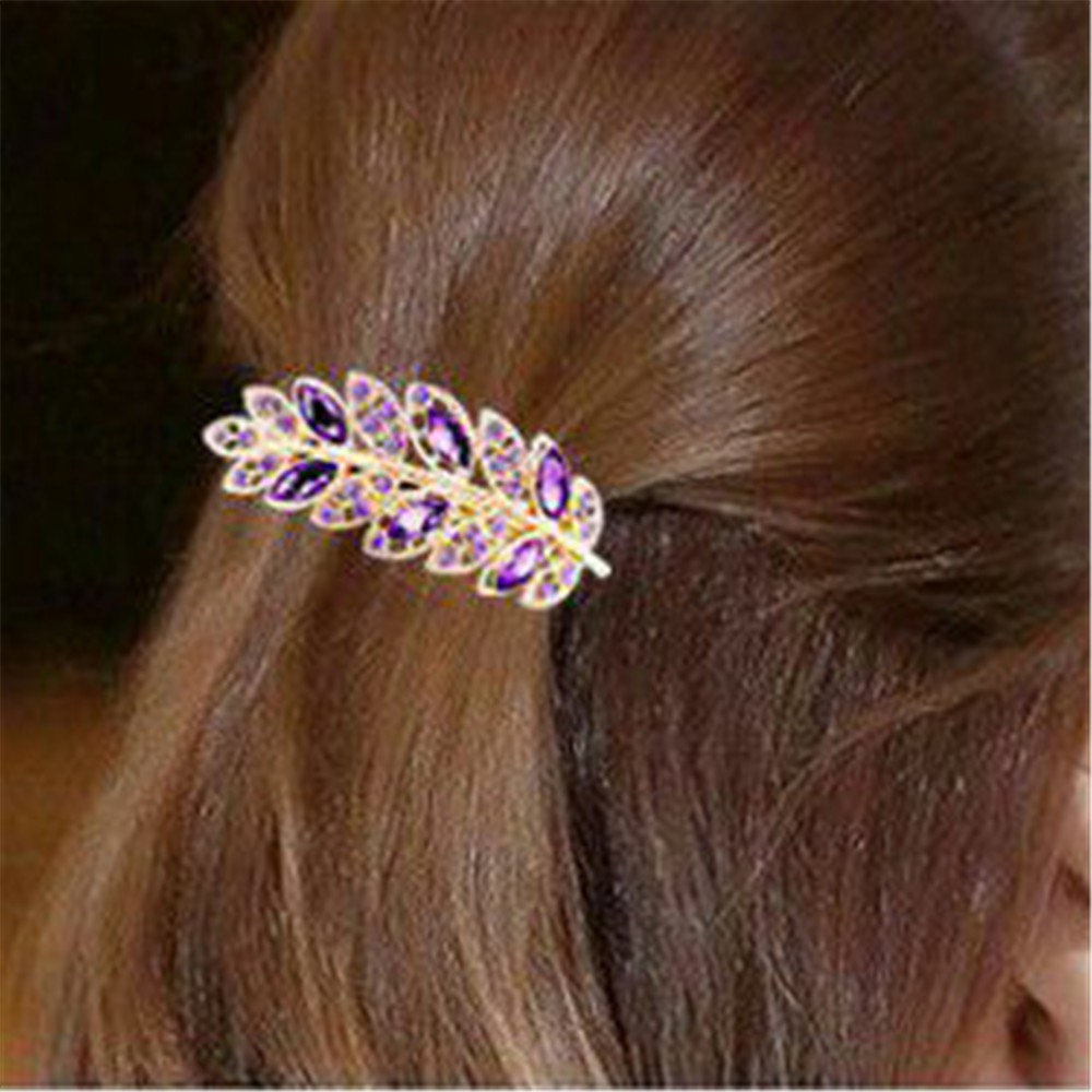 1 kẹp tóc hình chiếc lá đính pha lê và hột cực sang trọng