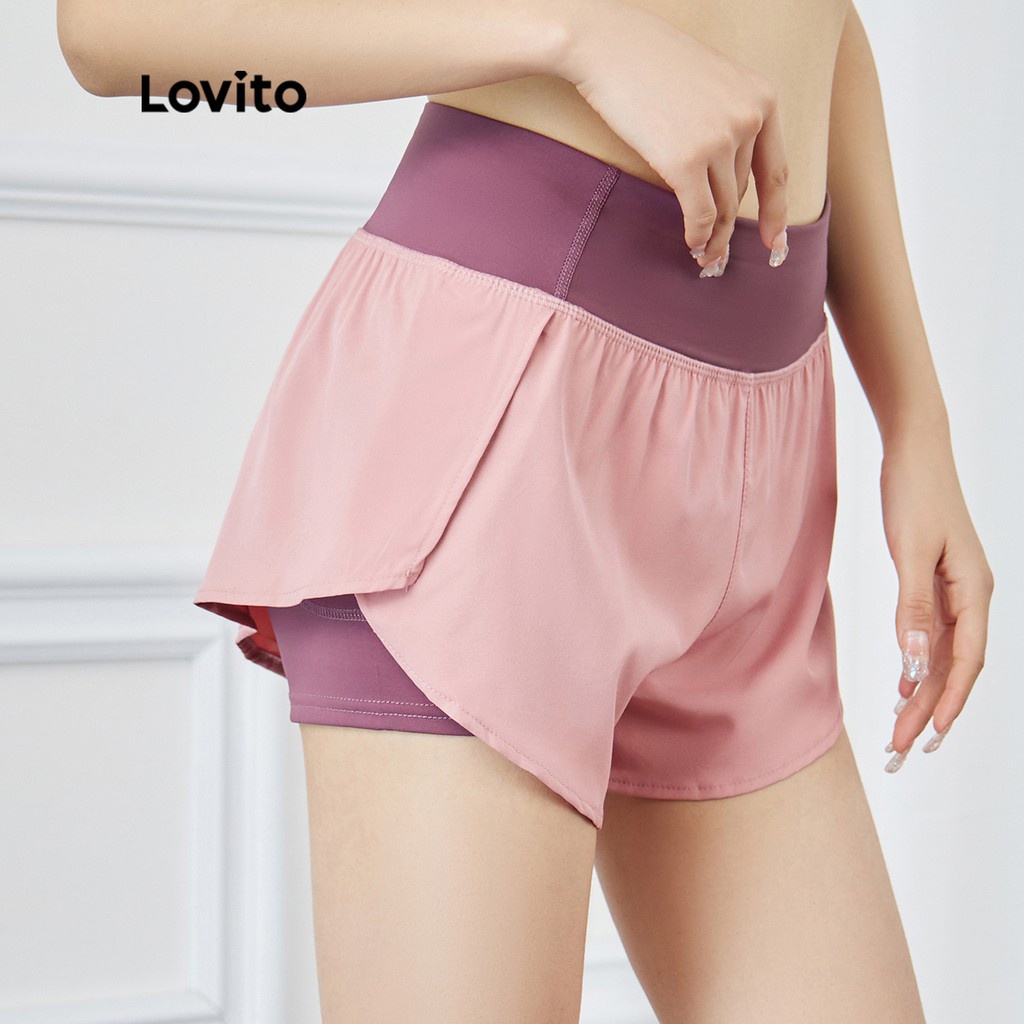 Quần short thể thao Lovito ghép nối màu phối túi xẻ tà L15X212 (màu hồng)