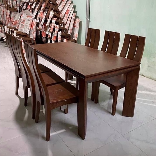 Bàn ăn mặt gỗ chân vát
