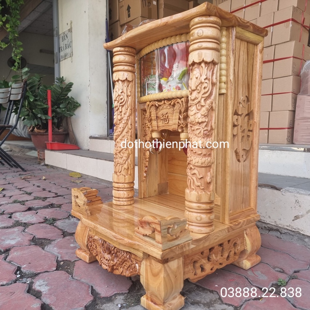 Bàn thờ thần tài ông địa gỗ xoan ngang 42cm quỳ trụ điện tử màu đỏ