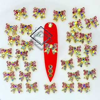 charm nơ hồng nhỏ mã 70