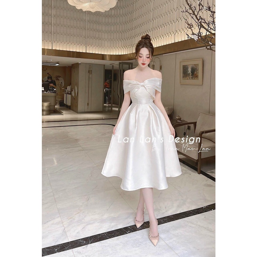 Đầm xòe midi trắng nơ ngực trễ vai tiểu thư dự tiệc, váy đầm trắng dáng dài xòe thiết kế phối nơ quyến rũ, sang trọng