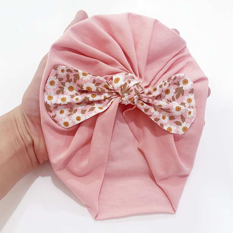 Mũ trùm đầu vải cotton mềm phối nơ in hoa cho bé trai và bé gái