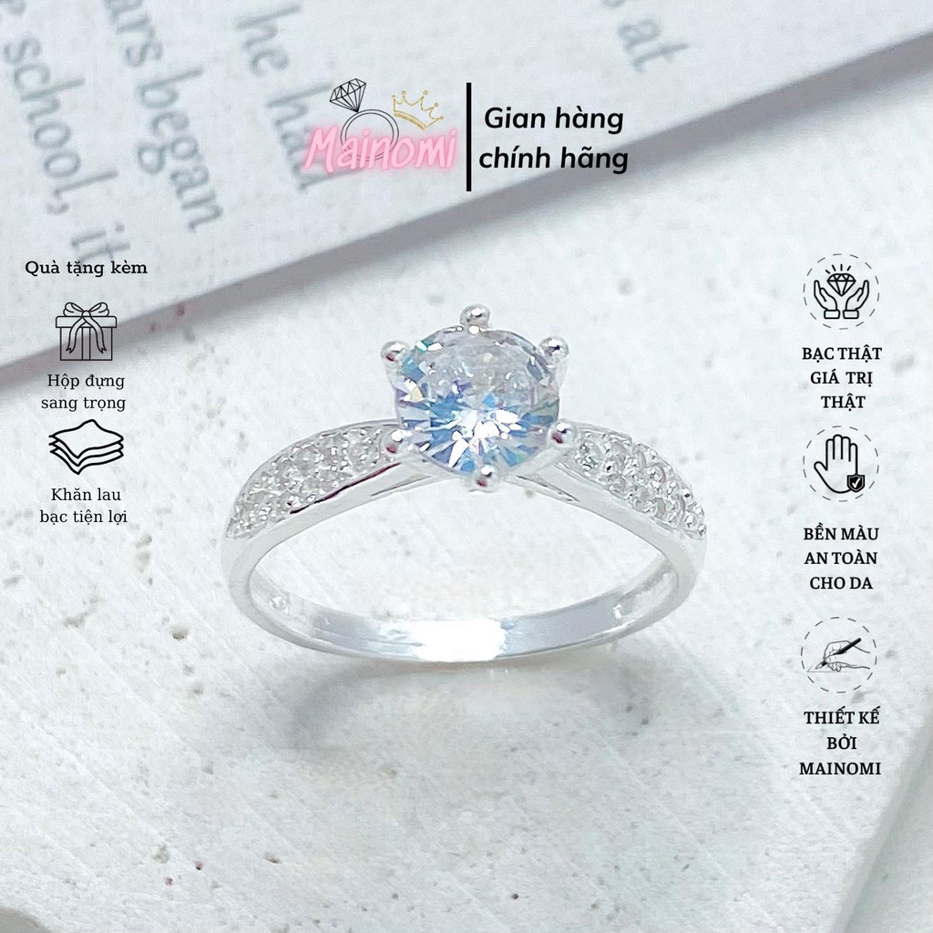 Nhẫn nữ đá cao 6 chấu MAINOMI viền dày nhỏ dần tạo nên nét đặc biệt. Mã kèm quà tặng