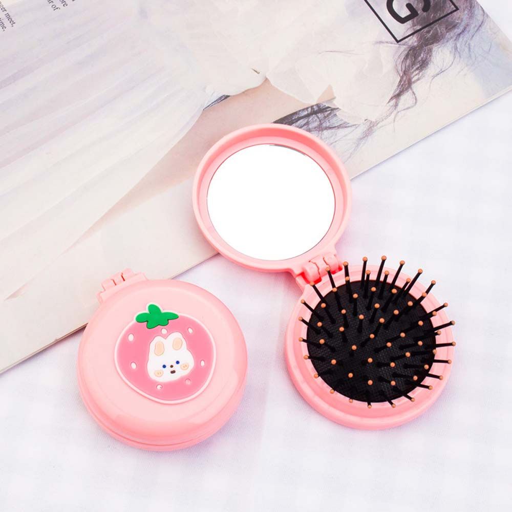 Lược chải tóc mini hình tròn gấp gọn kèm gương soi mát xa da đầu chống tĩnh điện thiết kế dễ thương