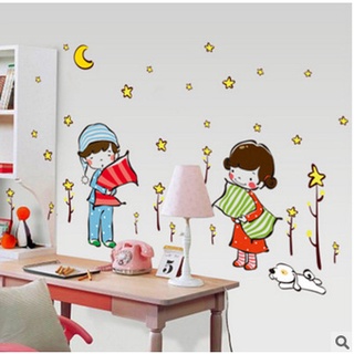 Decal dán tường bé ôm gối