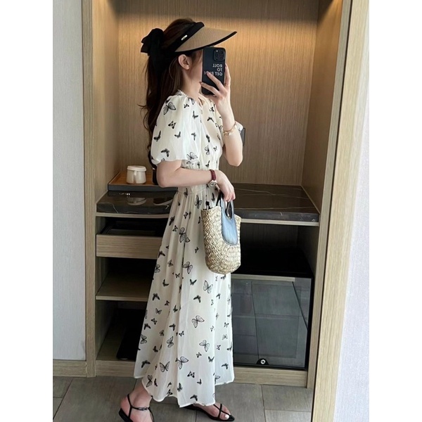 ĐẦM MIDI HOẠ TIẾT TAY BỒNG BO EO