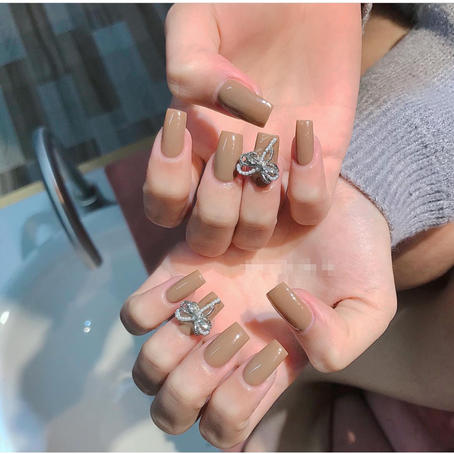 charm nơ kép vàng bạc