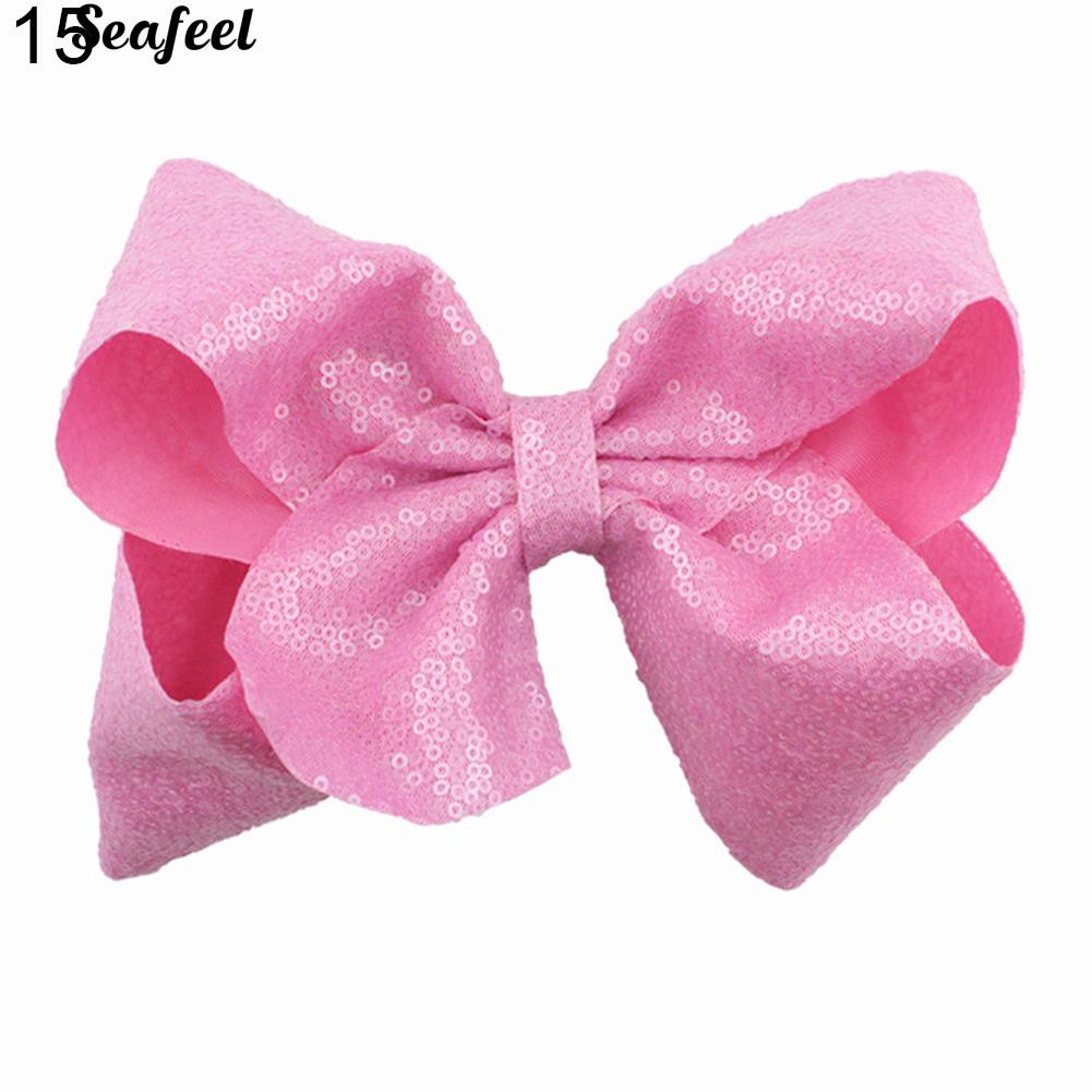 Kẹp tóc hình nơ đính sequin lấp lánh dễ thương dành cho nữ