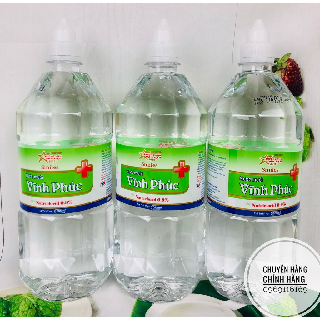 Dung dịch nước muối sinh lý 1000ml Vĩnh Phúc Smile 0.9% - Nước muối vệ sinh răng miệng dung tích 1 lít