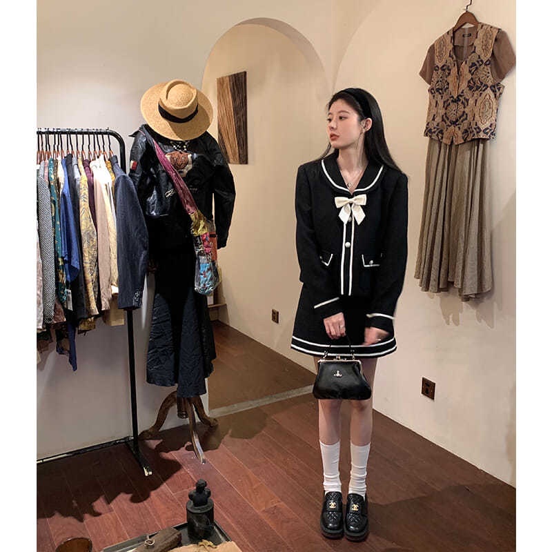 Set áo khoác dài tay + chân váy chữ A màu đen thời trang nữ