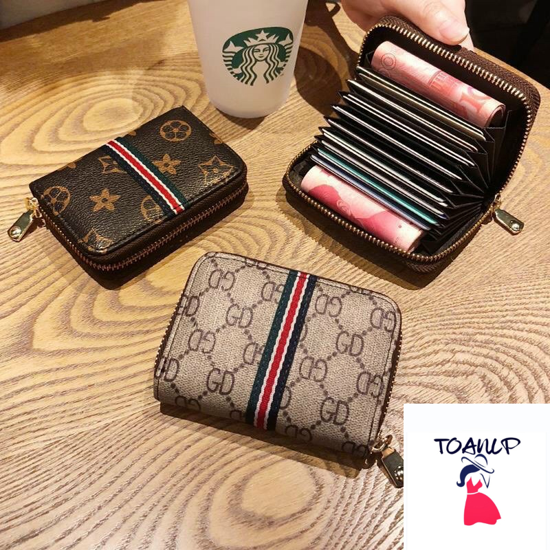 Ví nữ mini cầm tay nhỏ gọn họa tiết GC khóa kéo sọc giữa