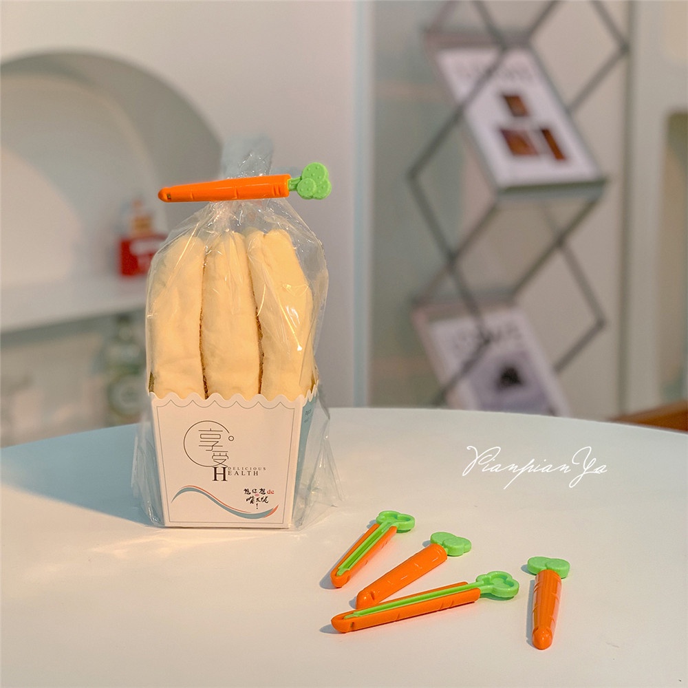 Bộ 5 kẹp túi đựng thực phẩm hình củ cà rốt kèm hộp đựng