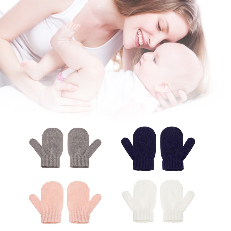 1 đôi găng tay dệt kim màu trơn giữ ấm mùa đông cho bé