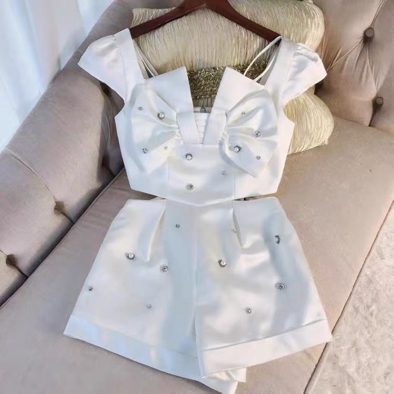 Jumpsuit mùa hè mới thời trang bộ đồ liền đính hạt nơ rỗng cắt eo