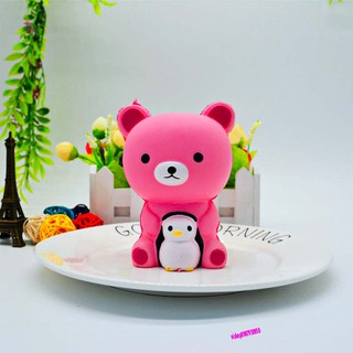 squishy gấu hồng ôm chim cánh cụt