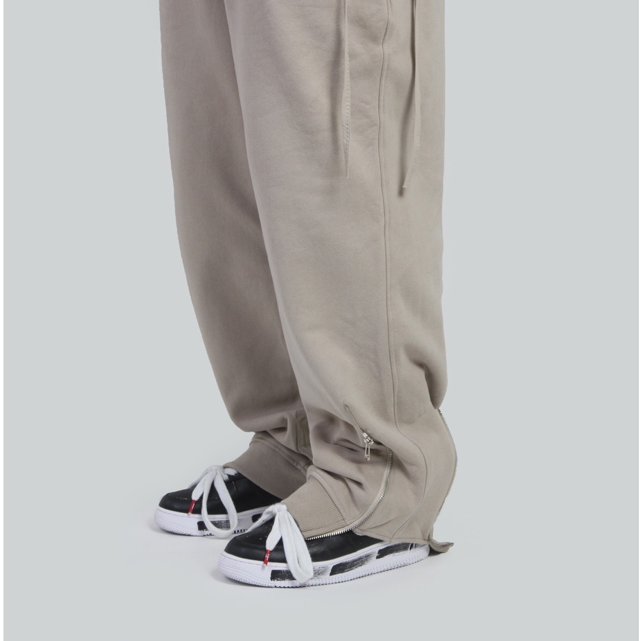 Quần Jogger Zip Kem
