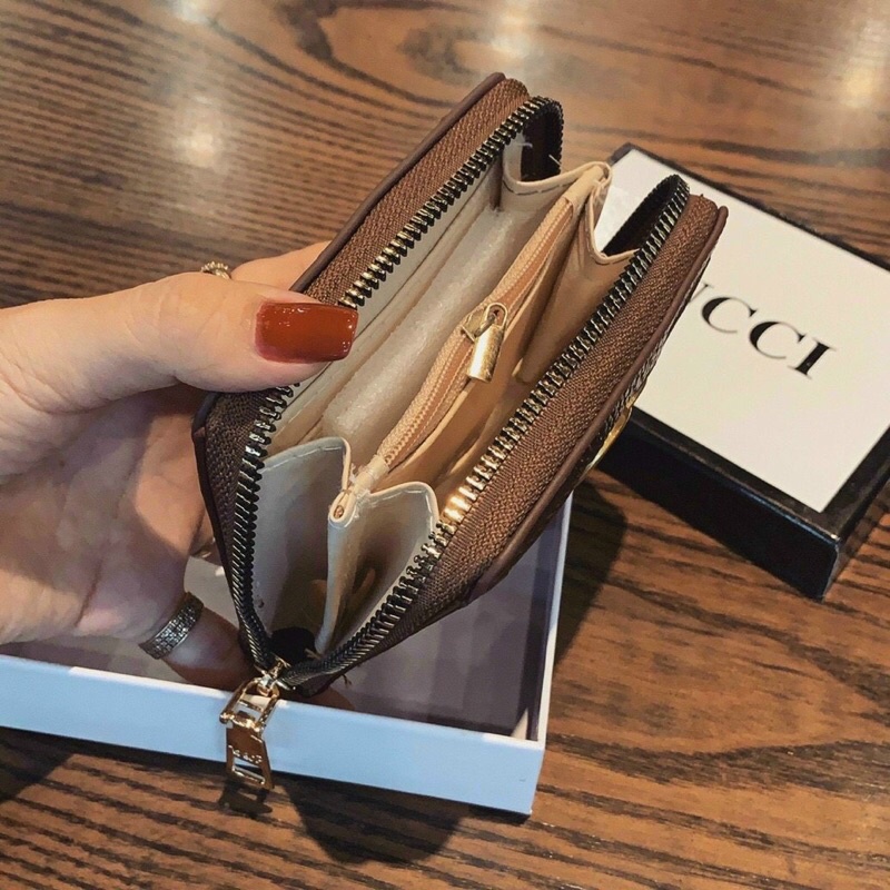 Ví  cầm tay  CG viền sọc  xiêu  xinh