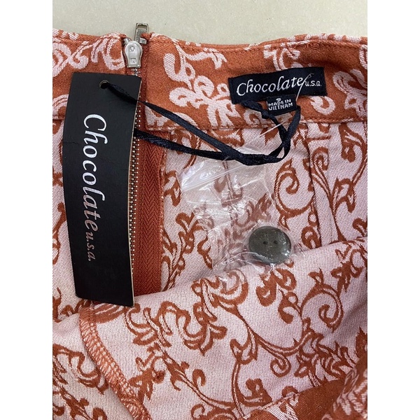 Chân váy dáng A phối nút vnxk co giãn