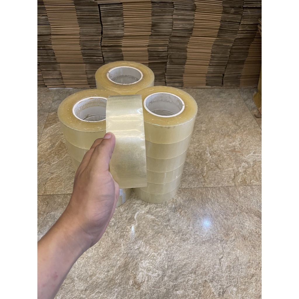 Băng dính màu trắng trong 0,5kg dùng gói hàng COD lõi siêu mỏng - 1 cuộn