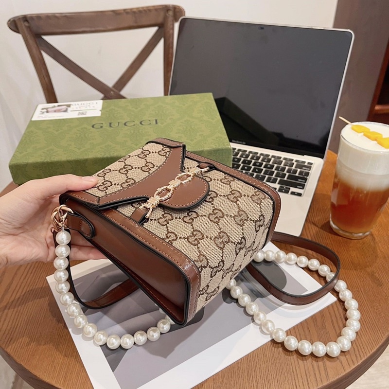 Túi xách thuỳ tiên hoạ tiết mới