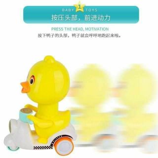 Đồ chơi vịt nhấn cót