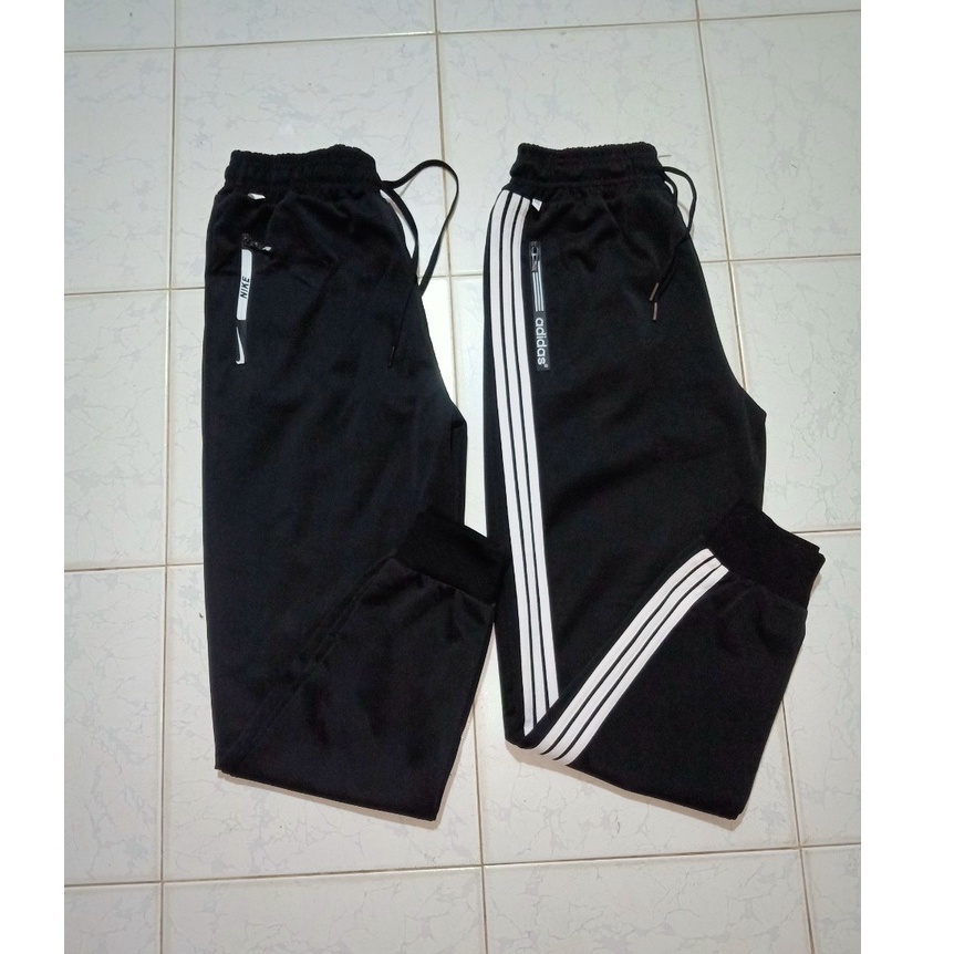 Quần thể thao Nam_Nữ có khóa kéo phối sọc UNISEX. Trẻ Trung Năng Động