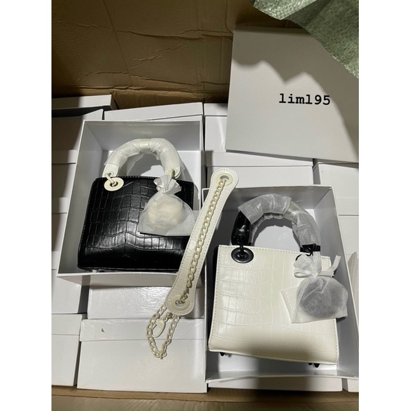 Túi cd lady da rắn đen trắng