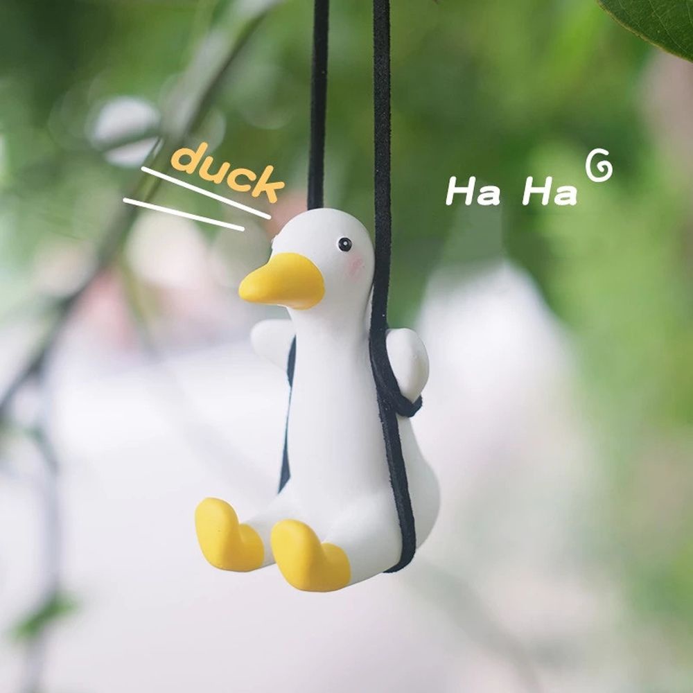 Dây treo trang trí hình chú vịt đánh đu vui nhộn có thể tỏa mùi hương cho xe hơi