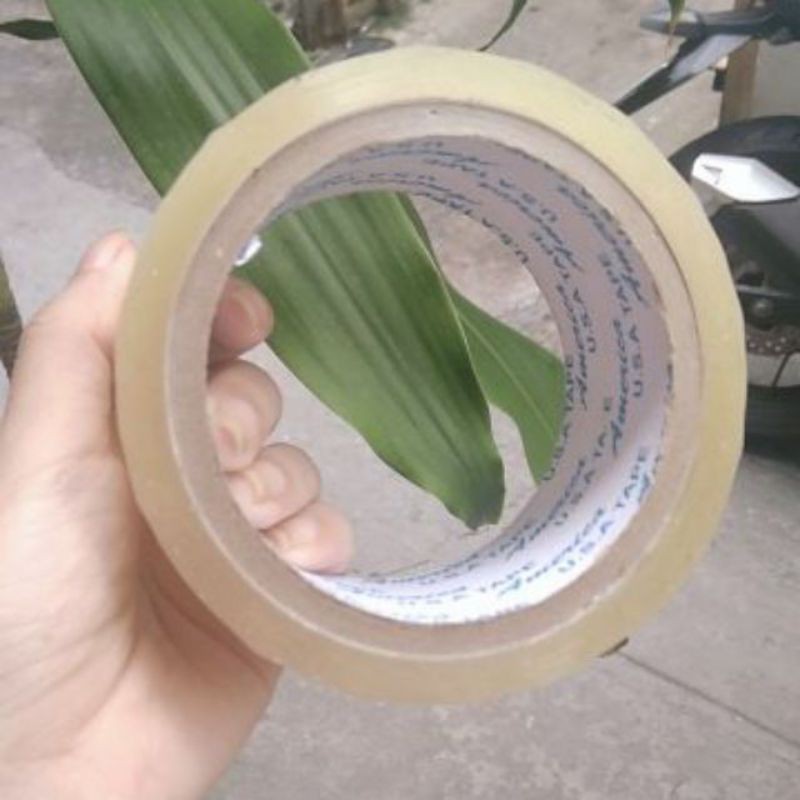 1 cuộn băng keo trong-băng keo đục siêu dính 100yard, loại tốt ,