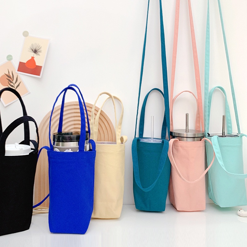 Túi Đựng Bình Nước Bằng Vải Canvas Màu Trơn Kèm Dây Đeo Tiện Dụng