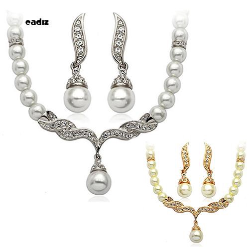 Bộ dây chuyền + bông tai hình đôi cánh đính ngọc trai giả