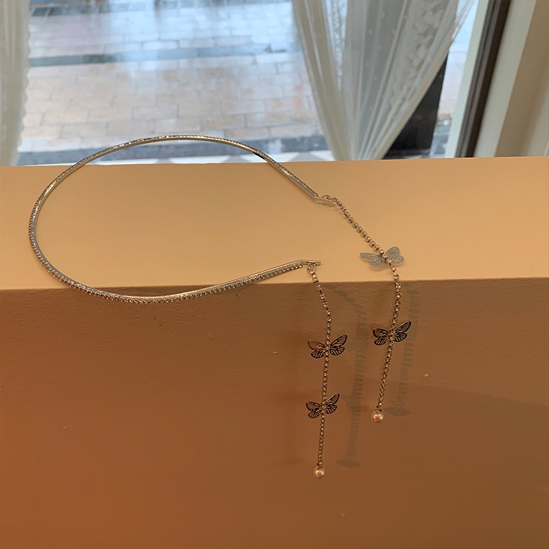 Cài tóc dây tua rua hình bướm đính ngọc trai ngọt ngào