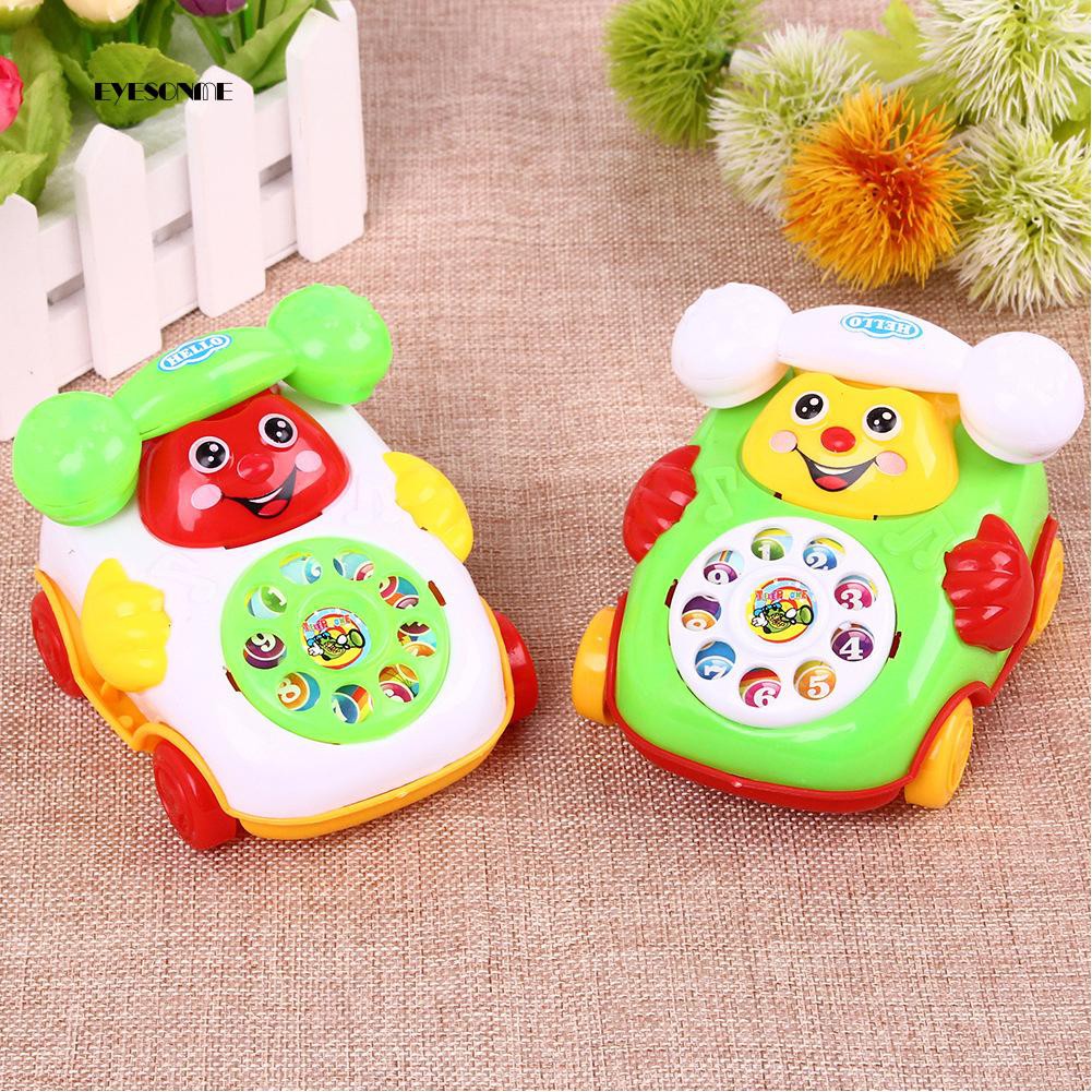 Đồ chơi điện thoại để bàn mặt cười cho bé