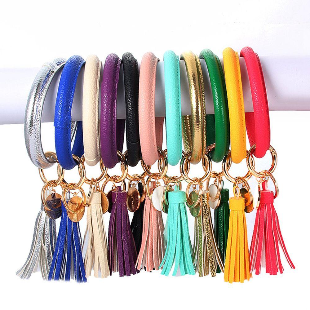 Vòng Đeo Tay Bằng Da PU Kèm Móc Khóa Hình Chữ O Phong Cách Boho Thời Trang