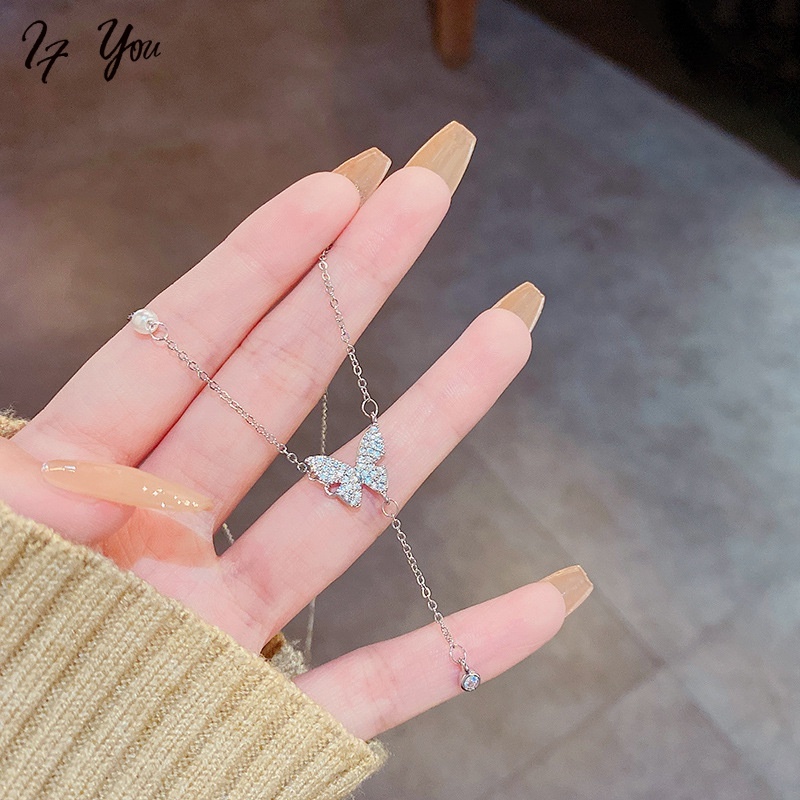 Vòng cổ choker AY mặt dây hình bướm đính pha lê ngọc trai giả thời trang