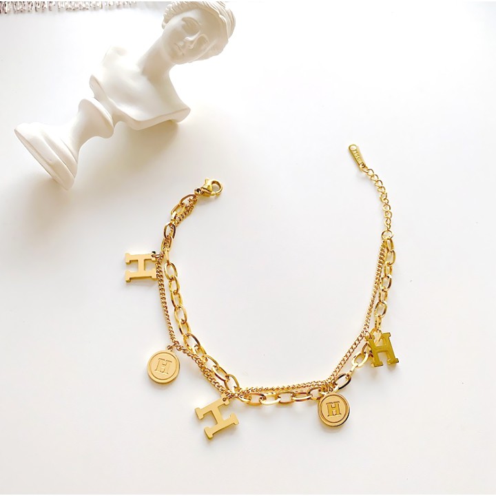 Lắc tay titan cao cấp chữ H HIP HOP màu vàng siêu đẹp, bền màu, chuẩn thời trang, mang phong cách độc đáo cá tính