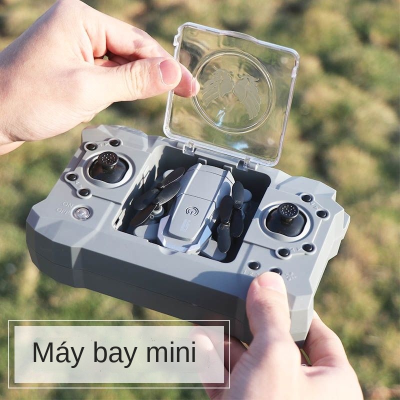 ﹉UAV camera trên không HD chuyên nghiệp mini bốn trục máy bay điều khiển từ xa trẻ em máy bay trực thăng đồ chơi học sin
