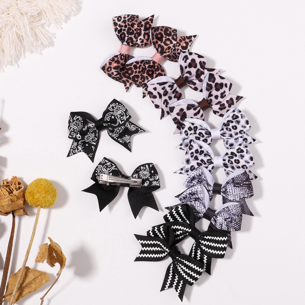Kẹp tóc KIDSBOWS đính nơ họa tiết da báo dễ thương cho bé gái 2.4&quot;