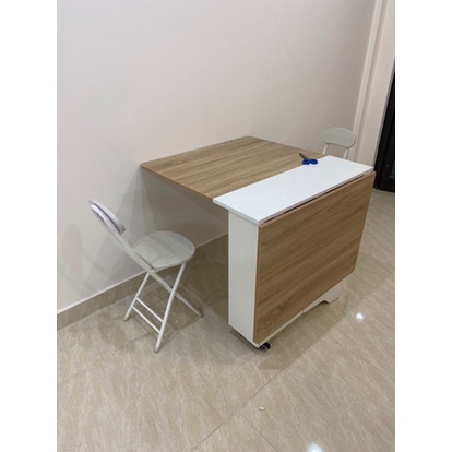 Bàn ăn thông minh IGA có kệ để đồ bánh xe xoay 360 độ