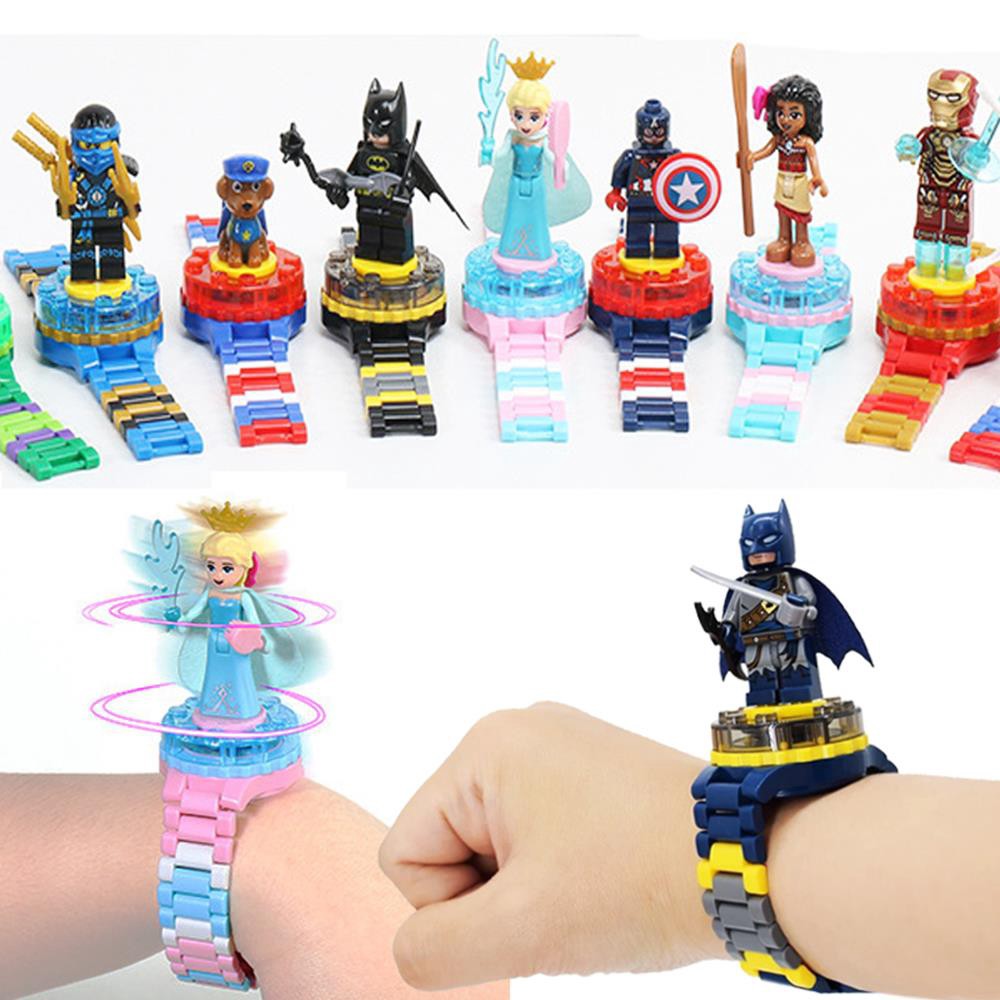 Đồng hồ điện tử đeo tay trẻ em con quay nhiều mô hình đồ chơi