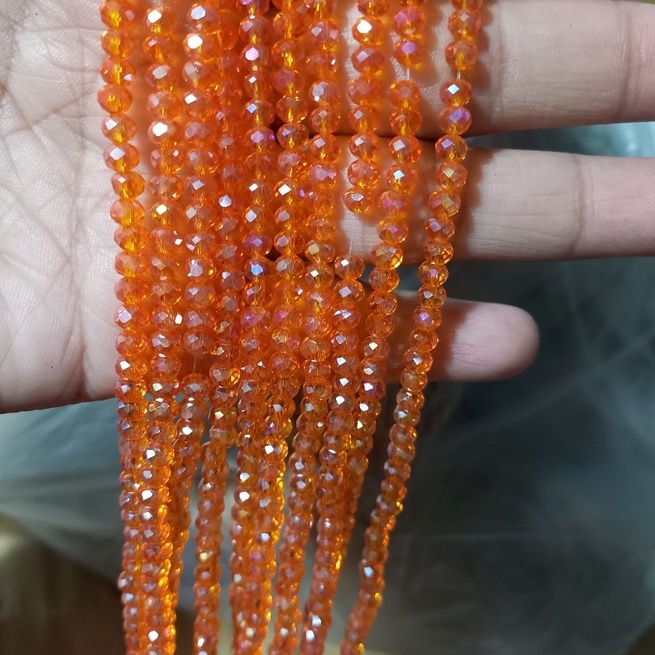 1 dây pha lê hình bánh cam size 4mm -khoảng 140 viên