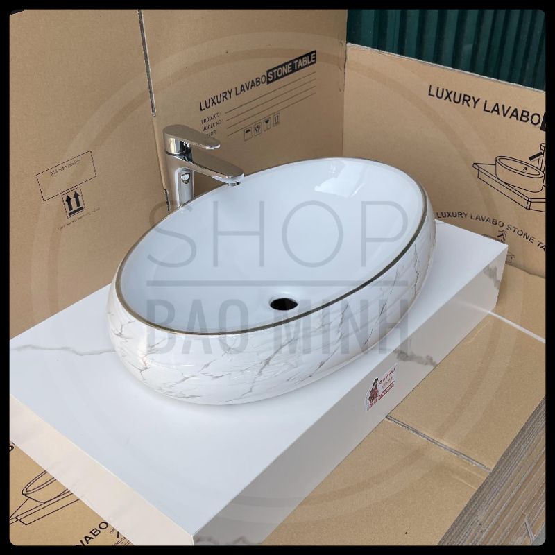 Chậu rửa mặt - Lavabo elip đặt bàn hoa văn vân đá cao cấp KT 60x40