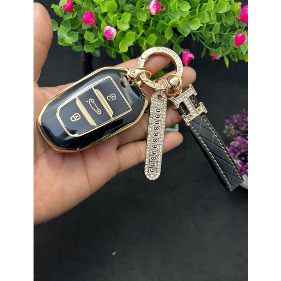 Bọc chìa khóa Peugeot 3008 – 5008 đen vàng sang trọng quý phái.