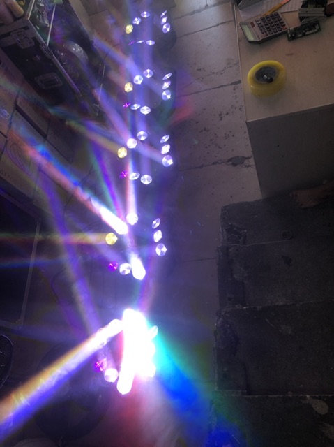 Đèn Moving 9 mắt to + laser+ chớp