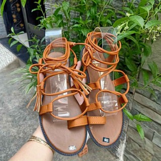 Dép sandal boho cột dây chiến binh tua rua