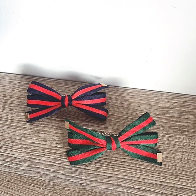Kẹp tóc nơ Gucci ba cánh